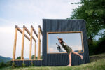 Young,Woman,Outdoors,,Weekend,Away,In,Container,House,In,Countryside.